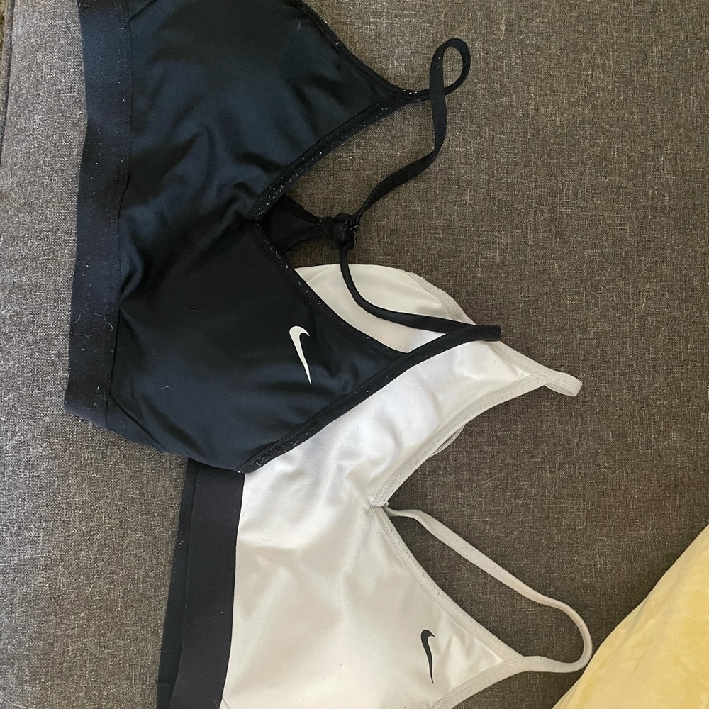 Two Nike sports bras sold together